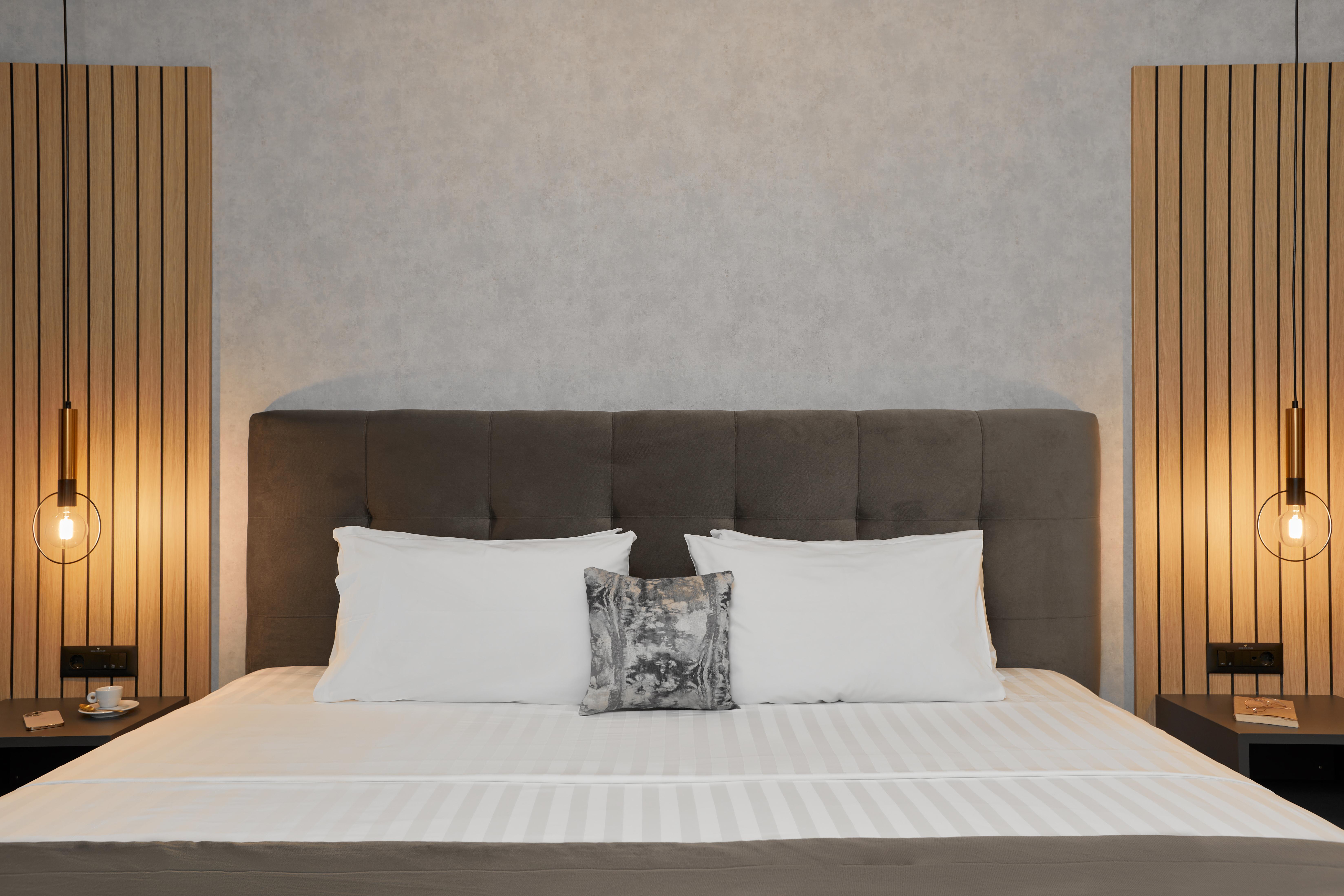 宫殿大酒店 塞萨洛尼基 外观 照片 A bed with a headboard